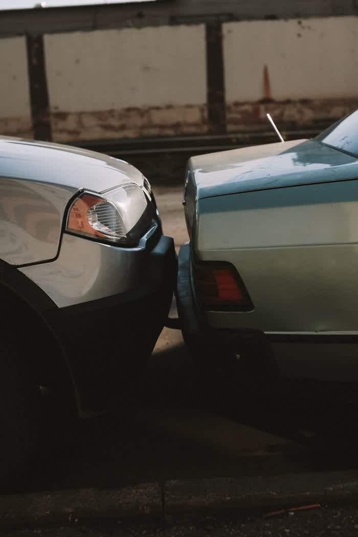 Two cars after a rear-end collision