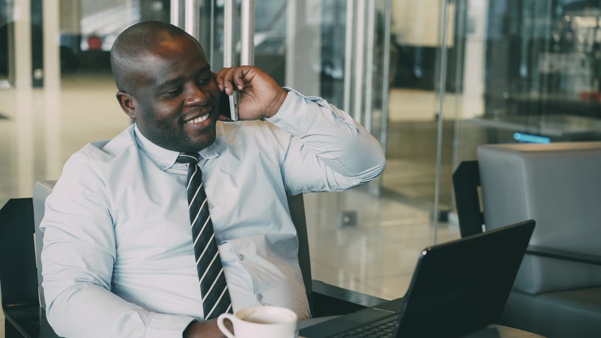 Smiling businessman talking on the phone