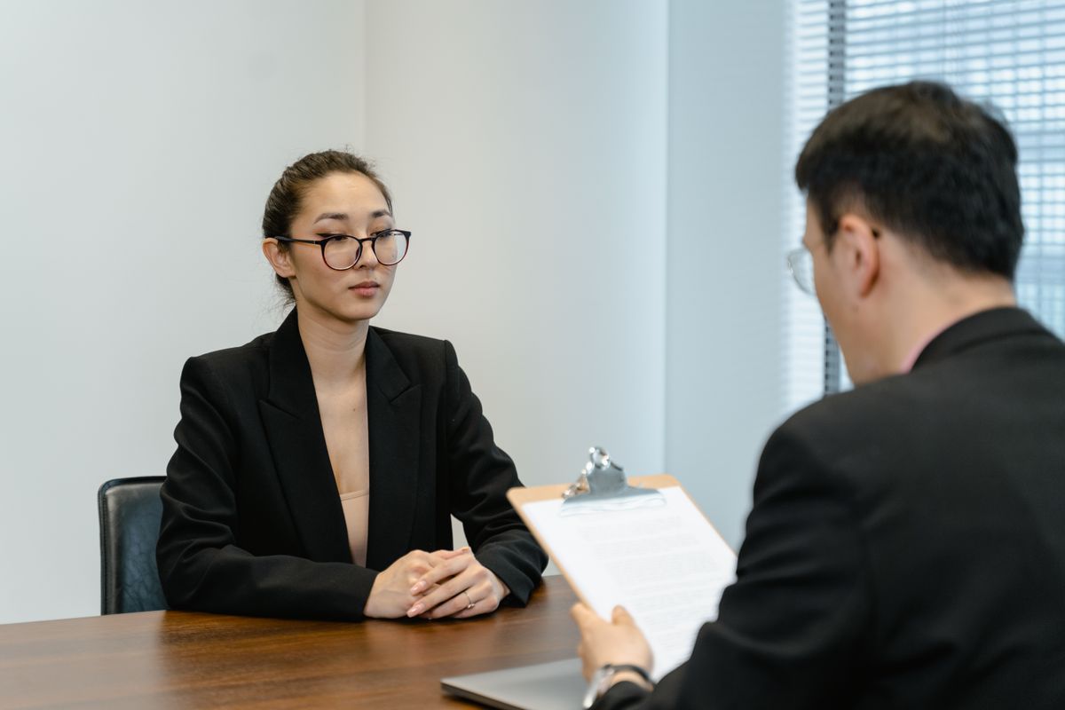 Business interview scene with professionals in office setting